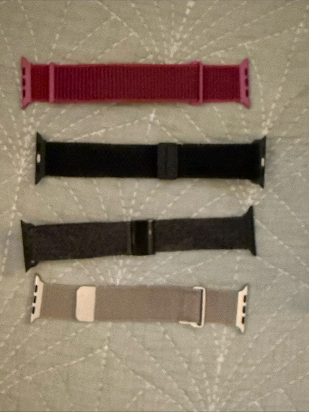 White Apple Watch Charger and 5 Apple Watch Bands Size 42/44